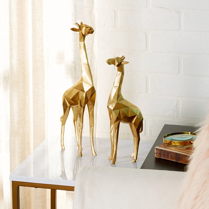 CosmoLiving by Cosmopolitan Gold Polystone Modern Giraffe Sculpture Set