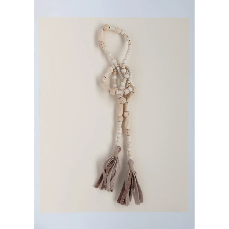 Hello Honey® 6ft. Paulownia Wood Beads with Fabric Tassels Garland