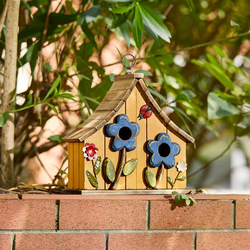 Glitzhome® 10.5" Yellow Distressed Wood Birdhouse with Flowers
