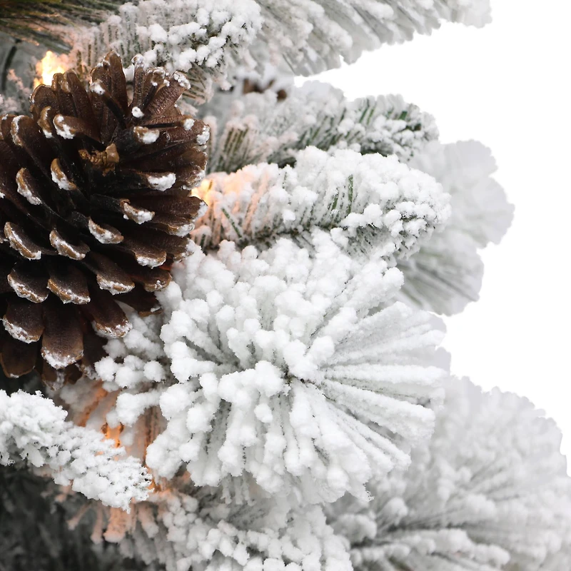 4.5ft. Pre-Lit Flocked Potted Pine Artificial Christmas Tree