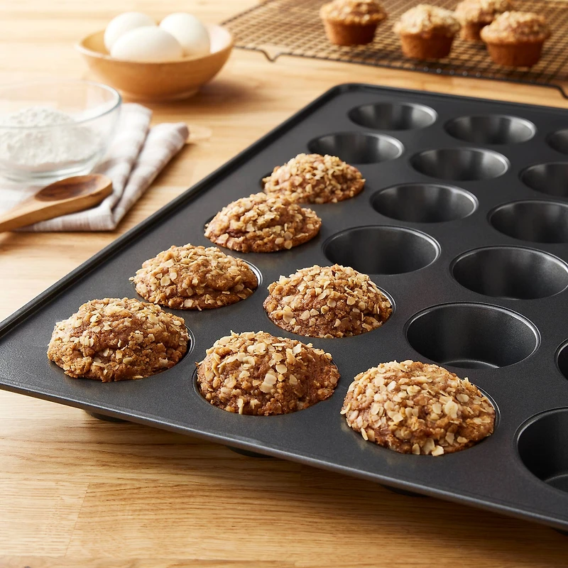 8 Pack: Non-Stick 24-Cavity Muffin Pan by Celebrate It®