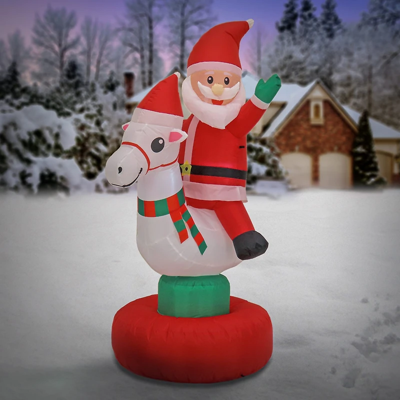 First Traditions™ 6ft. Red Inflatable Blow Up Santa on Rocking Horse with 3 Warm White UL LED Lights