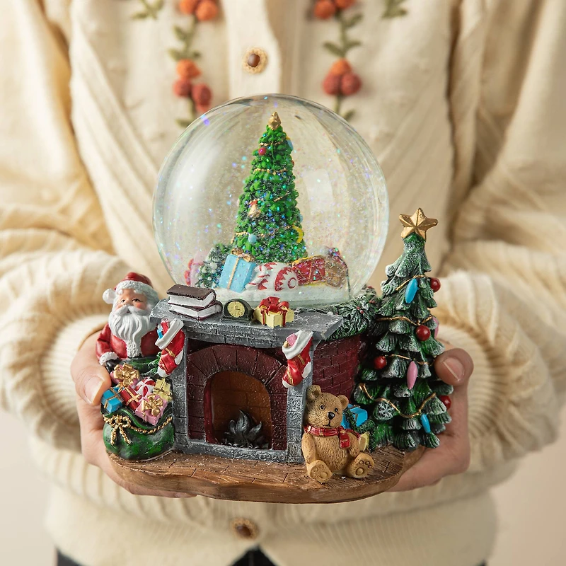 Glitzhome® 7.75" Lighted Musical Christmas Tree on Fireplace Waterglobe