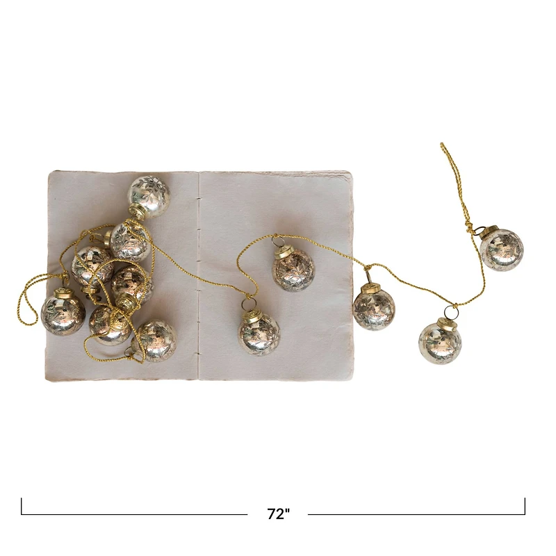 Hello Honey® 6ft. Antique Gold Etched Mercury Glass Ball Ornament Garland with Snowflakes