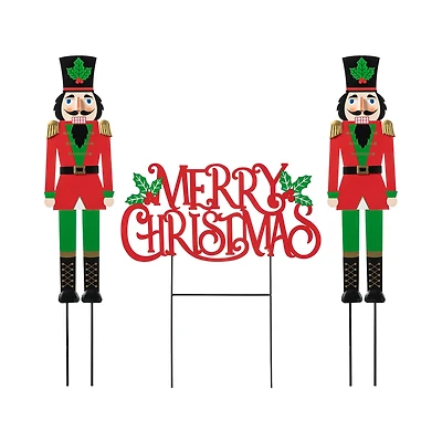 Glitzhome® Metal Nutcrackers & "MERRY CHRISTMAS" Yard Stake Set