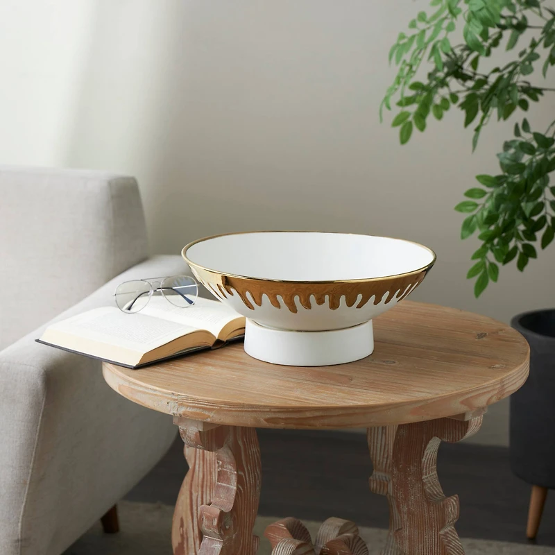 CosmoLiving by Cosmopolitan 15.5" Abstract White with Gold Melting Drips Ceramic Decorative Bowl