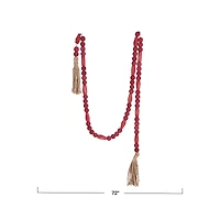 Hello Honey® 6ft. Burgundy Paulownia Wood Beads & Jute Tassels Garland