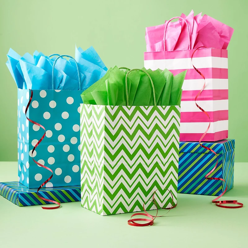 8 Packs: 13 ct. (104 total) Medium Bright Print Gift Bags by Celebrate It™