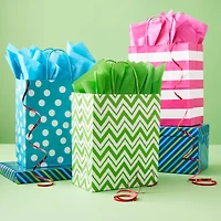 8 Packs: 13 ct. (104 total) Medium Bright Print Gift Bags by Celebrate It™