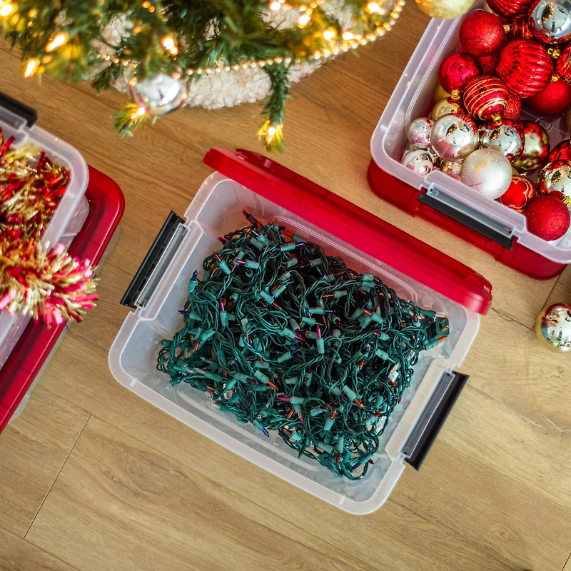 IRIS® 20.5qt. Clear Holiday Storage Boxes with Red Buckle Lids, 4ct.