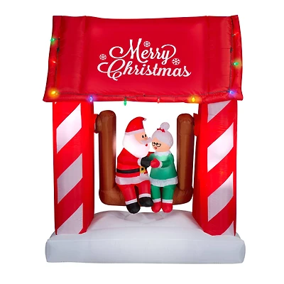 7ft. Animated Airblown® Inflatable Christmas Mr. & Mrs. Claus on Swing