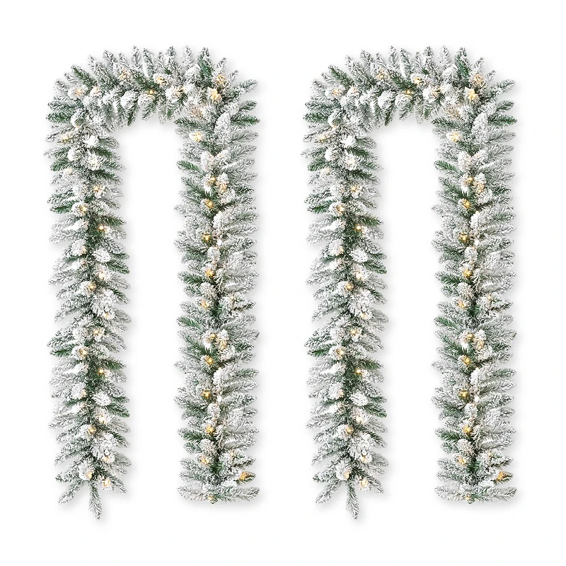 Glitzhome® 6ft. Pre-Lit Snow Flocked Christmas Garland, 2ct.