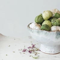 Hello Honey® 9" Green & Brown Stoneware Footed Bowl with Speckled Glaze