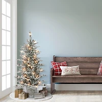 4.5ft. Pre-Lit Flocked Artificial Christmas Tree in Metal Planter, Clear Lights