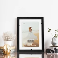 Expressions™ 7" x 9" Black Float Frame by Studio Décor®