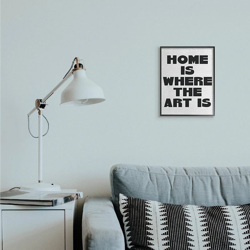 Stupell Industries Home Is Where Art Is Phrase Minimal Black White in Black Frame Wall Art