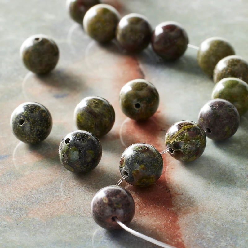 12 Pack: Dragon Blood Round Beads by Bead Landing™, 10mm