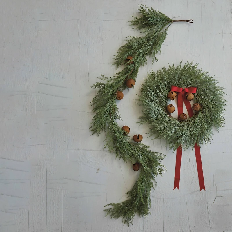 Hello Honey® 24" Round Mixed Pine Wreath with Red Ribbon & Rust Finish Metal Bells