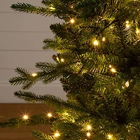 4.5ft. Pre-Lit Pine Artificial Christmas Tree in Decorative Planter with Clear LED Lights