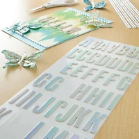 12 Packs: 99 ct. (1,188 total) Iridescent Foil Alphabet Stickers by Recollections™