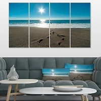 Designart - Blue Sea and Footprints in Sand