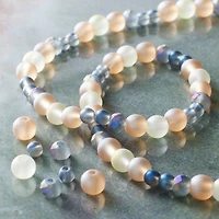 12 Pack: Pastel Pink & Purple Faceted Glass Rondelle Beads by Bead Landing™