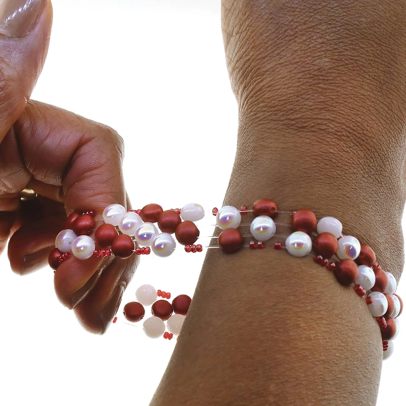 The Beadsmith® Opelon® 0.7mm White Stretch Jewelry Fiber