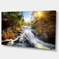 Designart - Waterfall through the Forest - Large landscape Canvas Art Print