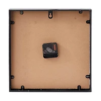 Black Metal Modern Wall Clock, 12" x 3" x 12"