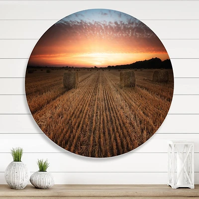 Designart - Landscape With A Field Full of Hay Bales At Sunset