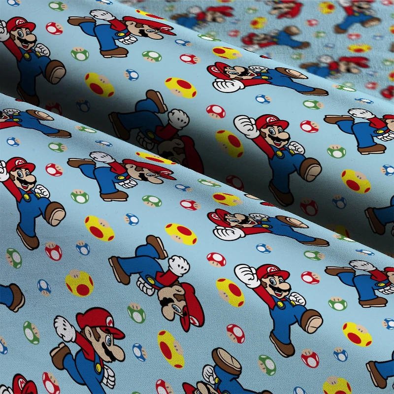 Nintendo® Mario Mushroom Light Blue Toss Cotton Fabric