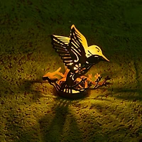Glitzhome® 9.75" Metal Flying Hummingbird Silhouette Solar Powered Edison Bulb Outdoor Lantern