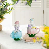 Glitzhome® Set of 2 Easter Resin Bunny on Tulip Mug Table Decor