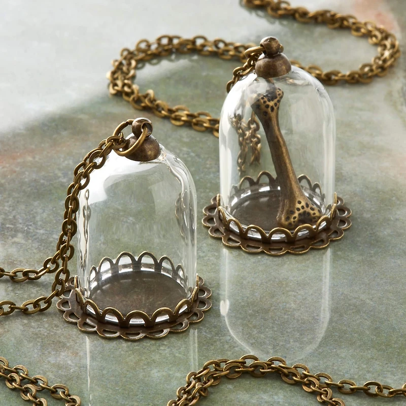 Found Objects™ Oxidized Brass Small Bottle Charms By Bead Landing™