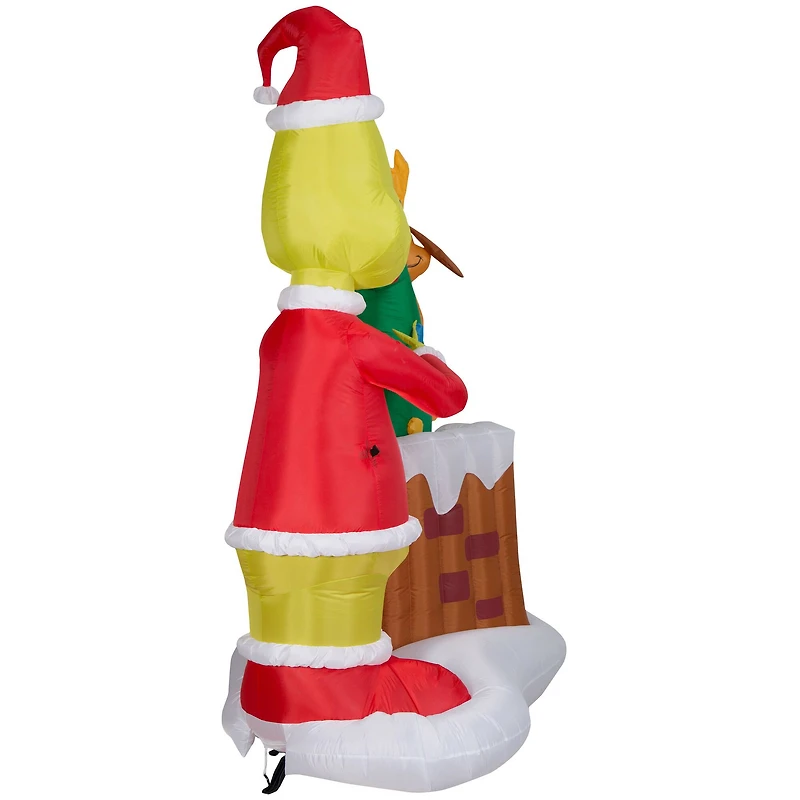 6.5ft. Animated Airblown® Inflatable Christmas Grinch Pulling Tree from Chimney