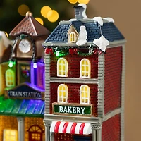 Glitzhome® 13.75" Lighted Christmas Train station Resin Village with Movement and Music