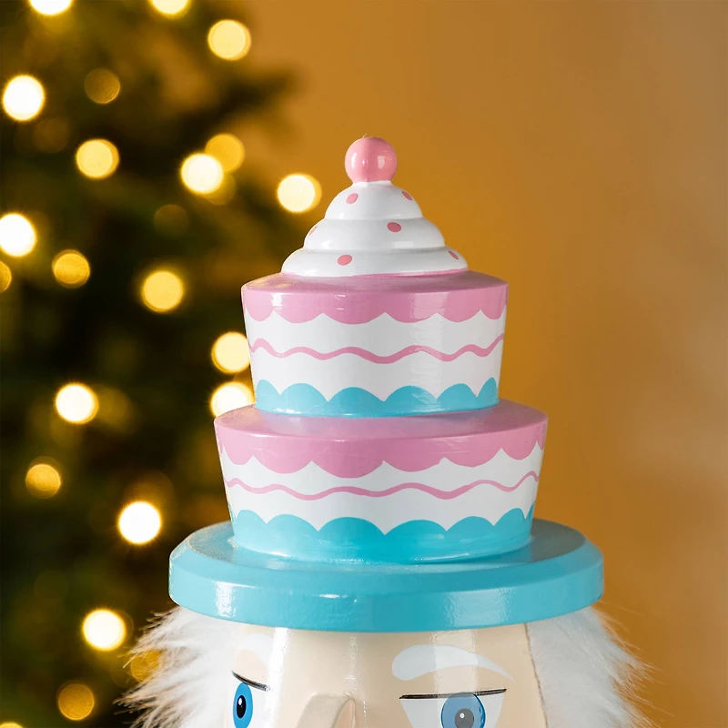 Glitzhome® 24"H Wooden Christmas Pink Cake Nutcracker