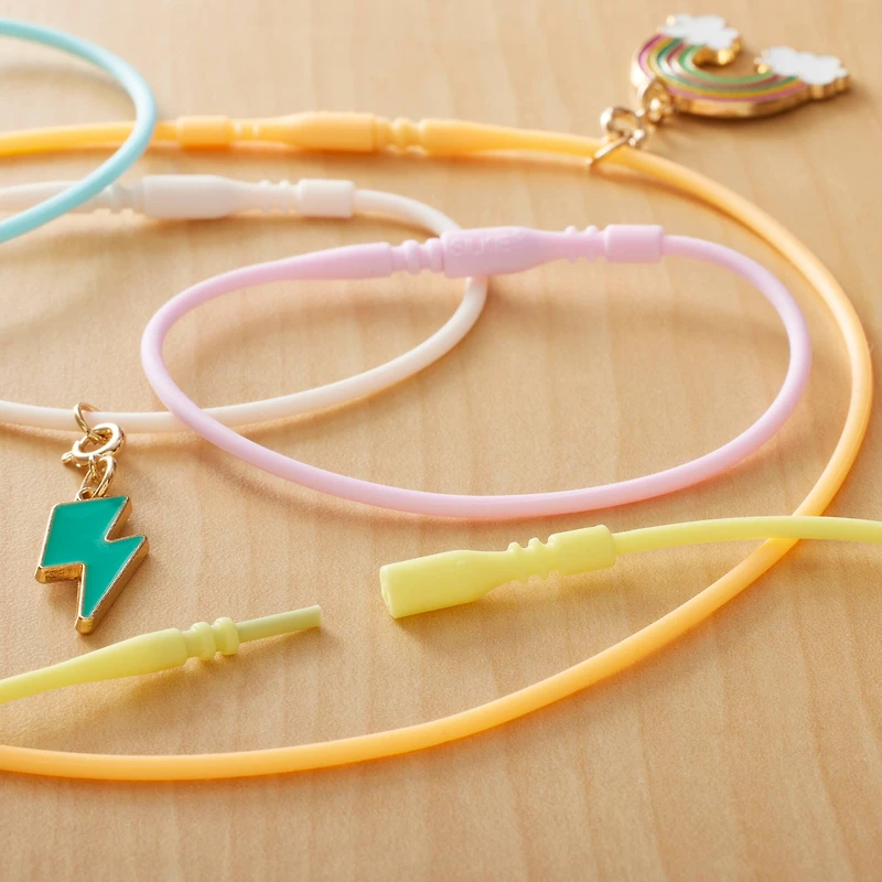 Pastel Mix Silicone Bracelets & Necklaces by Creatology™, 12ct.