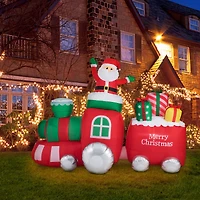 Glitzhome® 8ft. Lighted Inflatable Santa On Pick-Up Train Décor