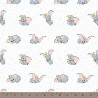 Disney® Classics White Many Faces of Dumbo Cotton Fabric