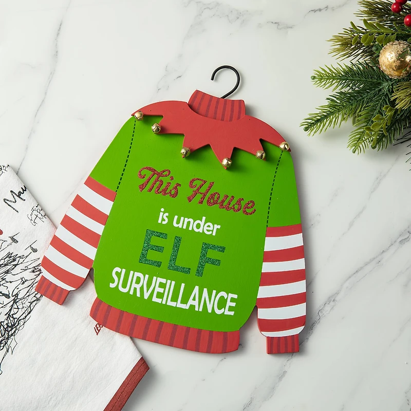 Glitzhome® 13.25" Christmas Elf Sweater Sign Door Hanger