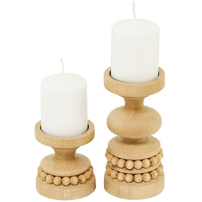 The Novogratz Brown Wood Beaded Pillar Candle Holder Set