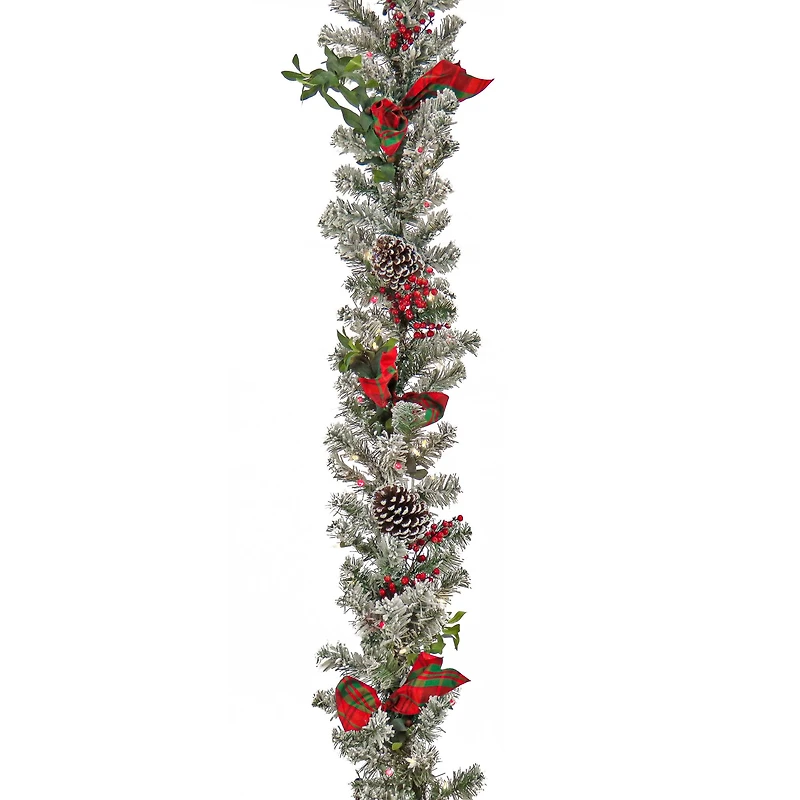 9ft. General Store Snowy Garland with LED Lights & Bows