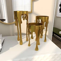 CosmoLiving by Cosmopolitan Gold Aluminum Pillar Candle Holder with Dripping Melting Designed Legs Set