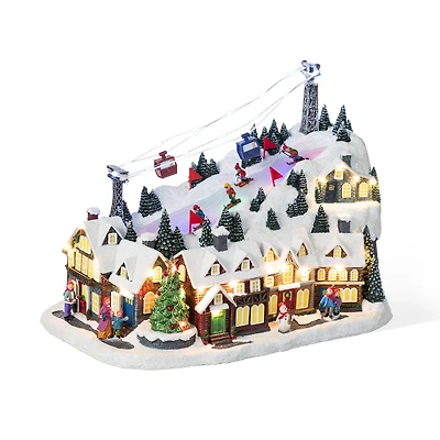 Glitzhome® 16" Christmas Oversized Resin Lighted Musical Skiing Table Village Decor