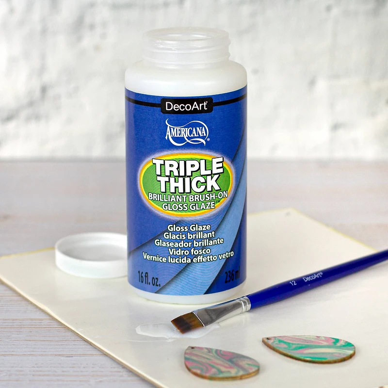 12 Pack: DecoArt® Americana® Triple Thick Brilliant Brush-On Gloss Glaze™, 16oz.