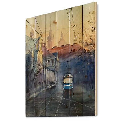 Designart - Blue Tram At Sunset With Church During Sunset