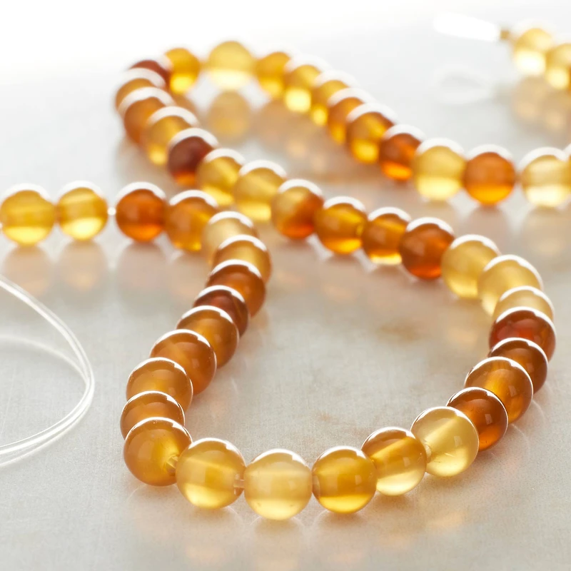 12 Pack: Yellow Agate Round Beads by Bead Landing™, 4mm