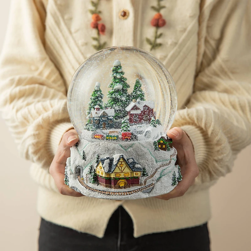 Glitzhome® 8" Lighted Musical Snowflakes Village Waterglobe