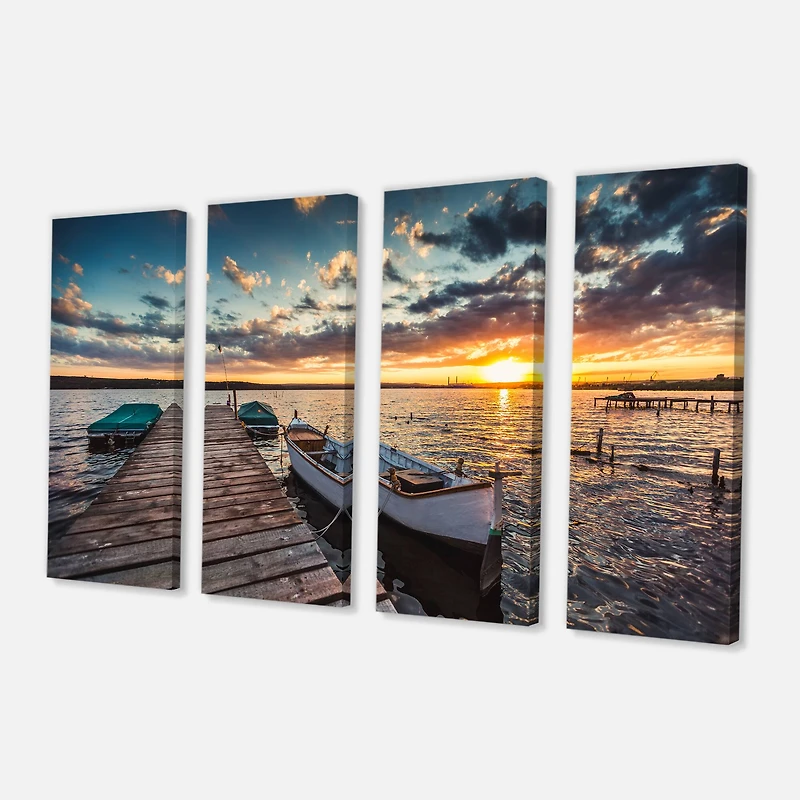 Designart - Boats and Jetty under Dramatic Sky